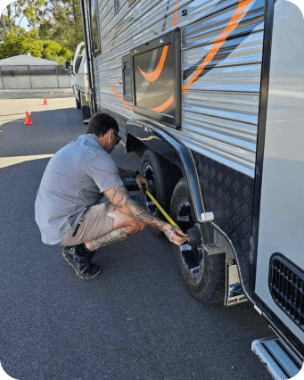 Man Measuring Tires